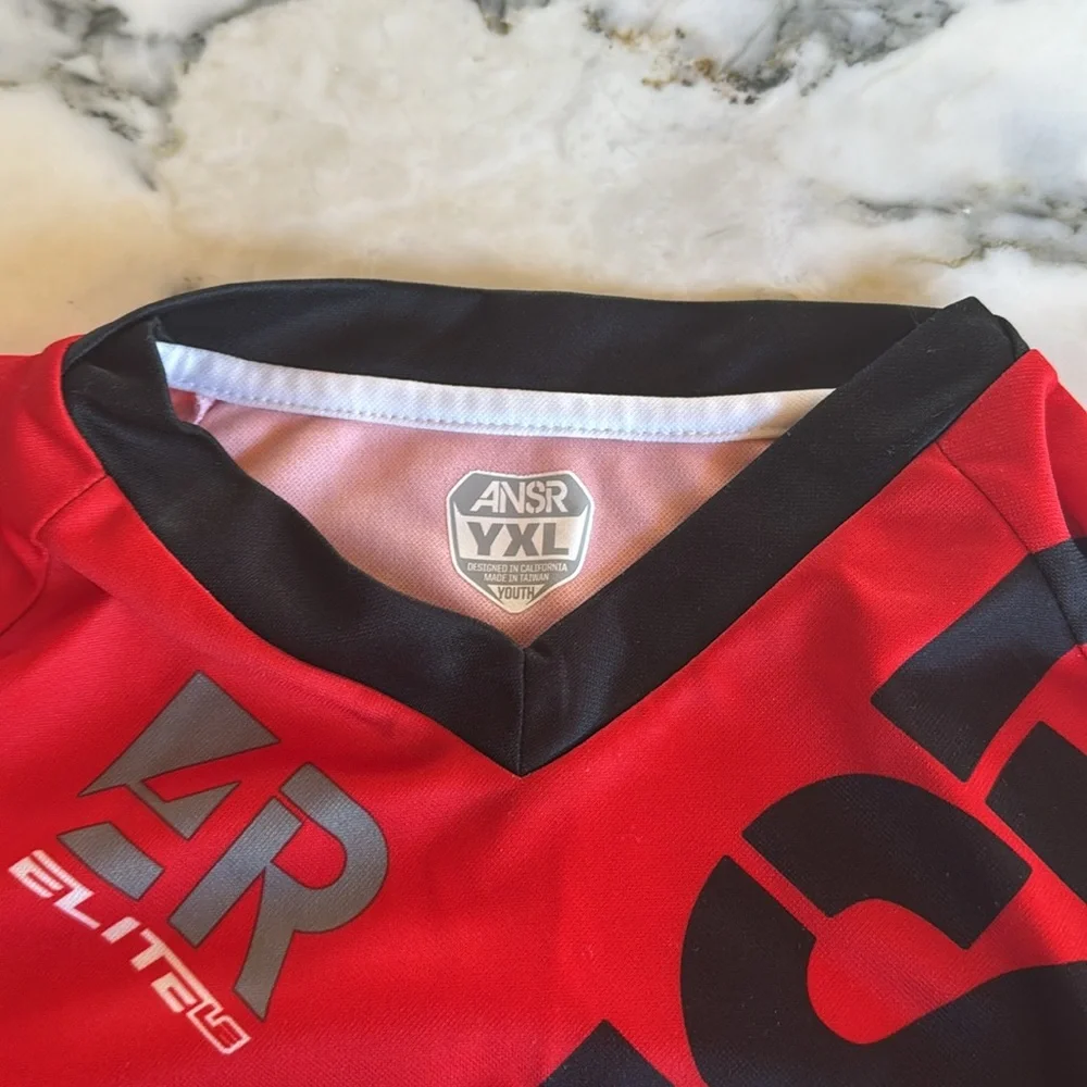 ANSR Red and Black Jersey with Asymmetrical Design and Bold Graphics Youth XL
